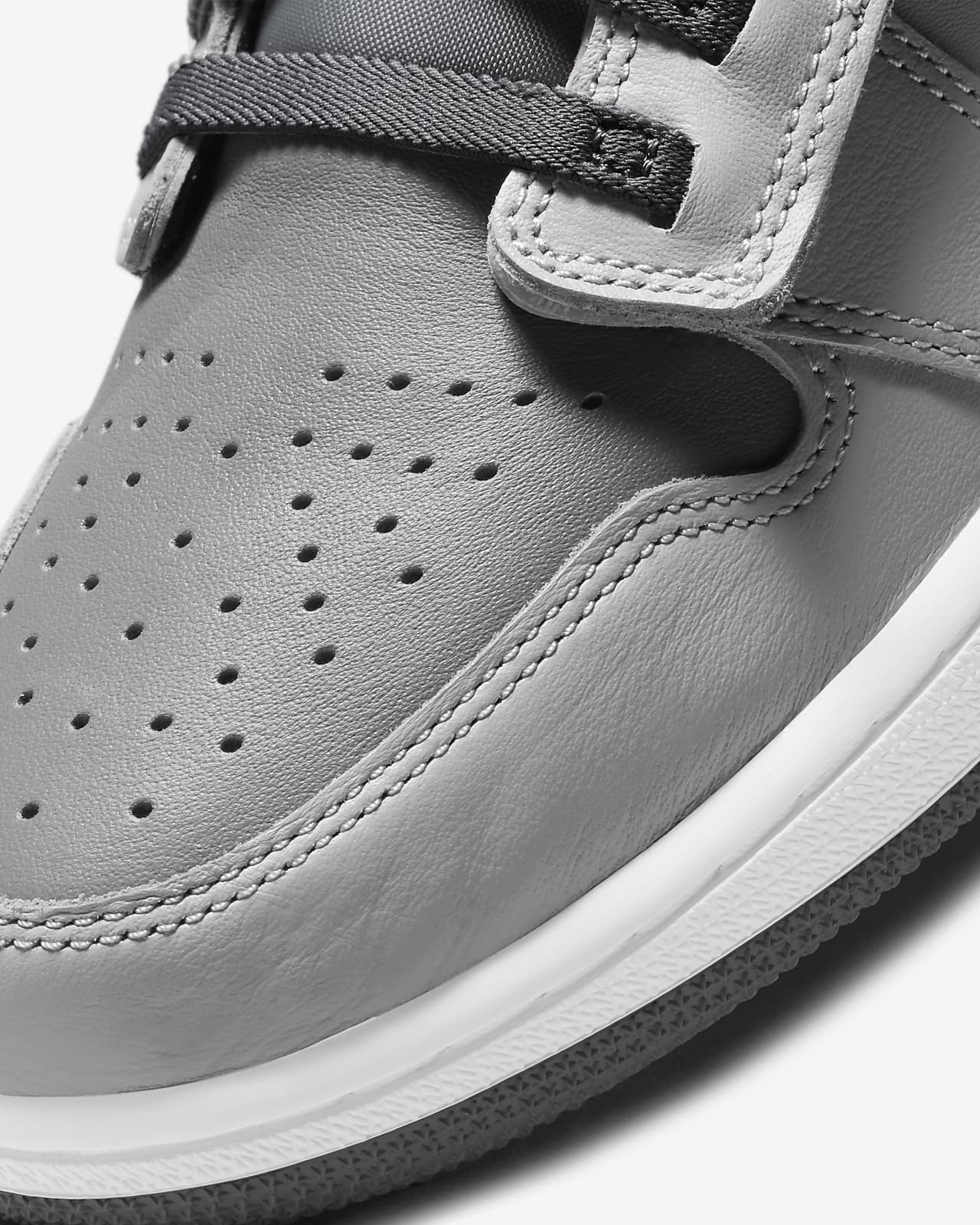 black and gray jordans 1