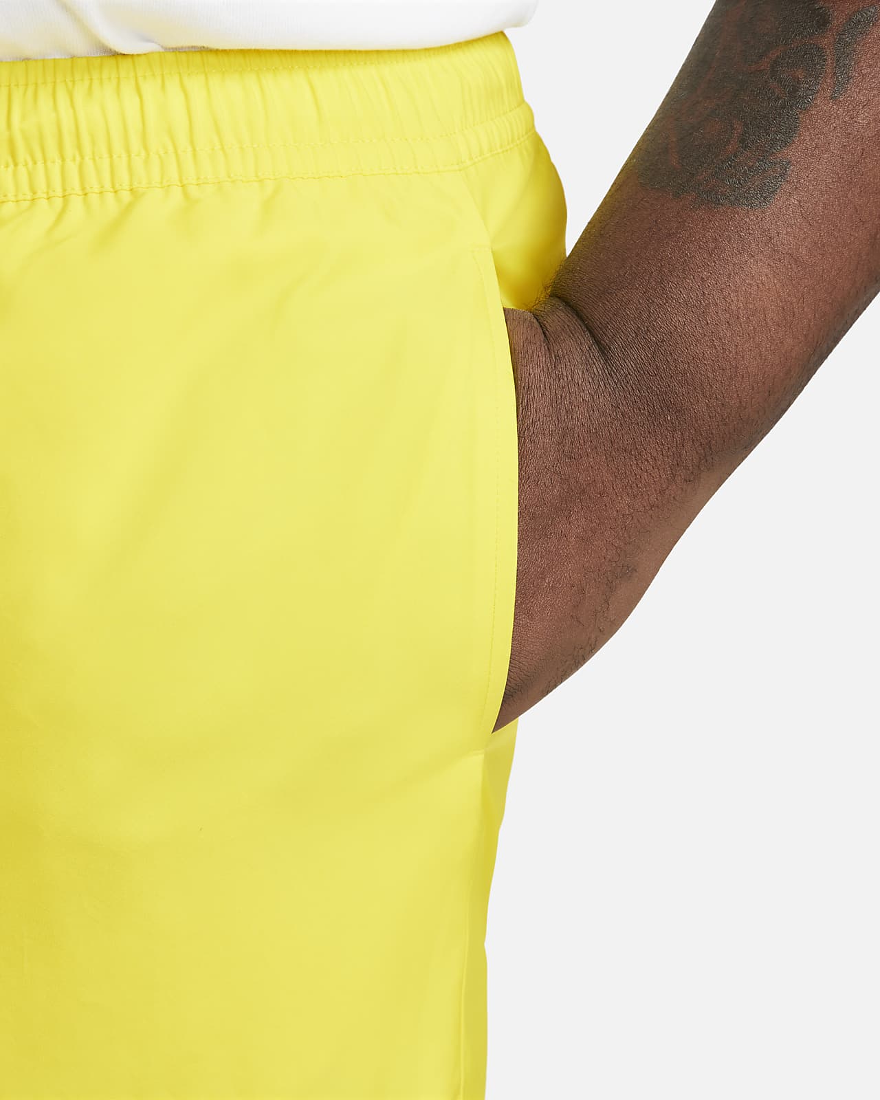Nike club essentials woven flow sales shorts yellow