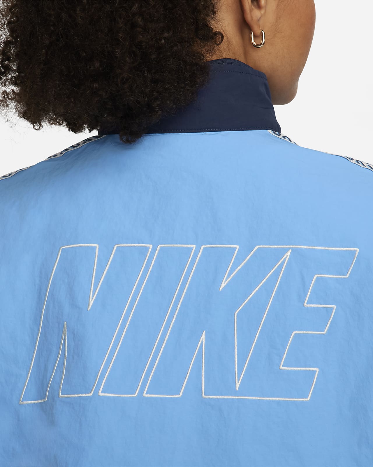 Nike Sportswear x Nike United Women's Oversized Woven Track Jacket.