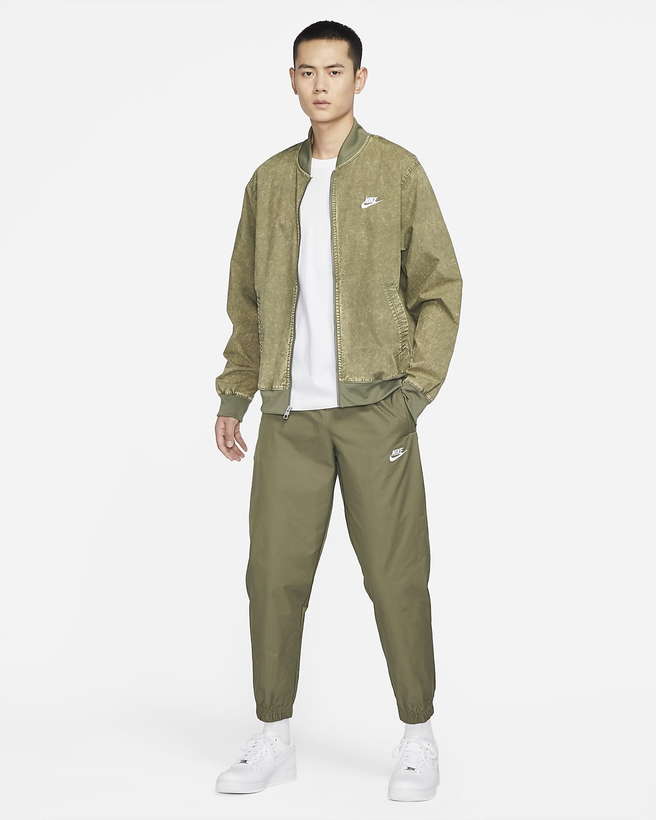 Nike Sportswear Men's Unlined Cuff Trousers. Nike SG