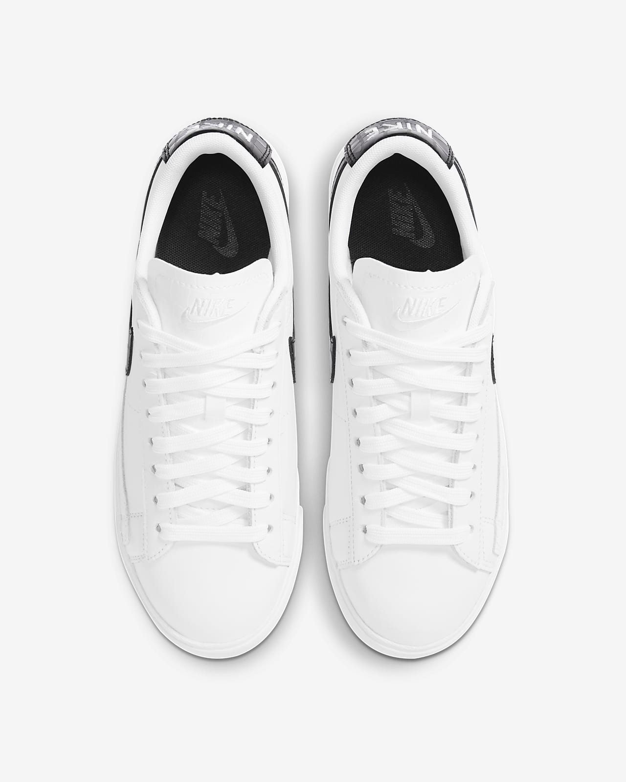 nike blazer sneakers in white and black