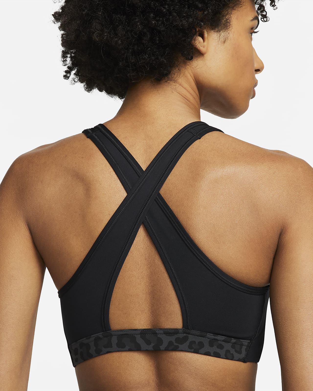 Bra non imbottito a sostegno medio con stampa leopardata Nike Dri-FIT  Swoosh – Donna. Nike IT