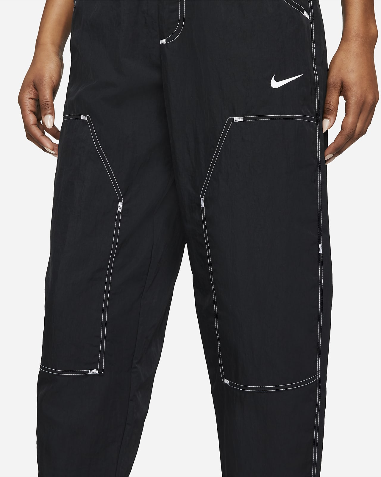 Pantalones de tiro alto de tejido Woven para mujer Nike Sportswear Swoosh.  Nike.com