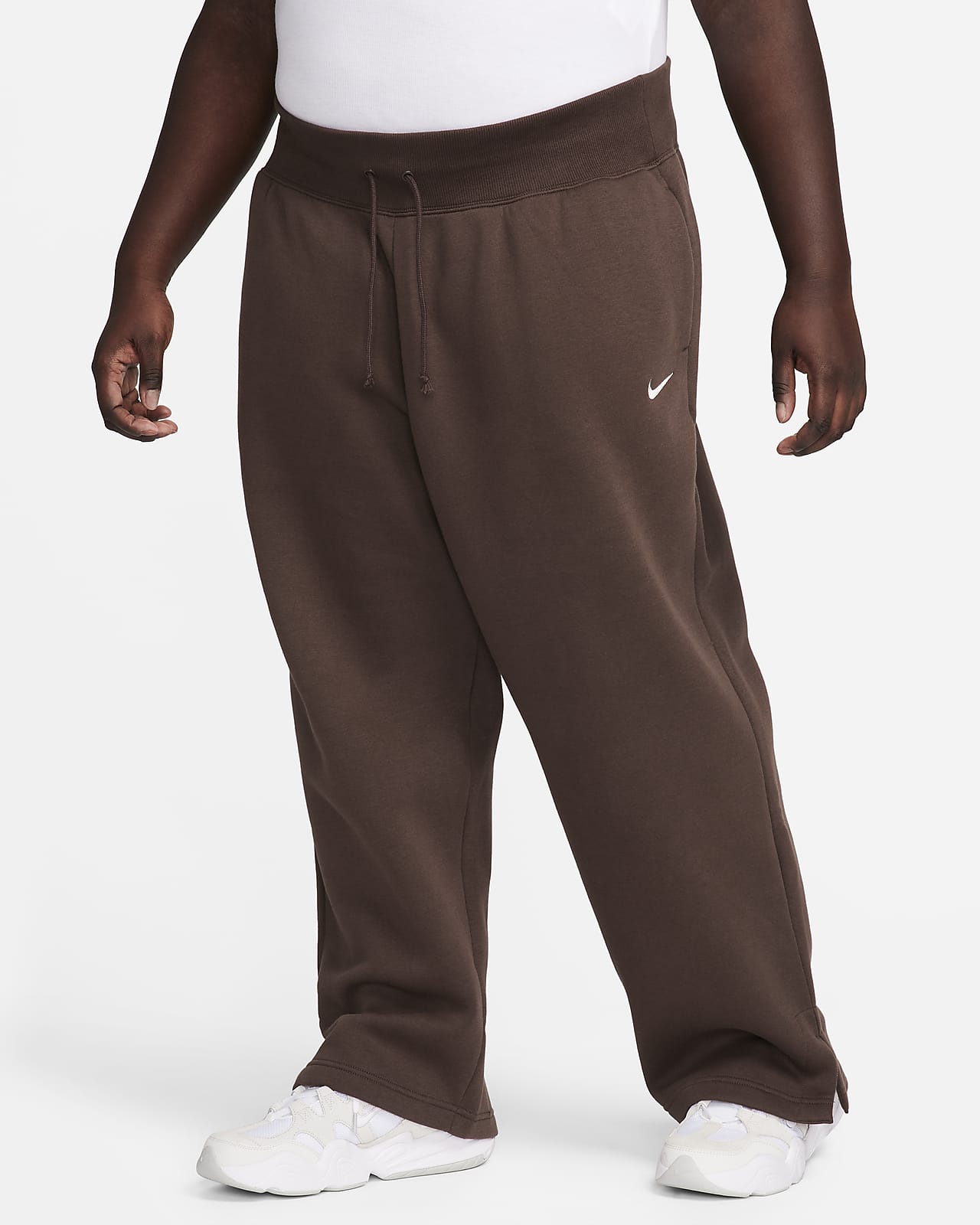 Pants de entrenamiento de piernas anchas y tiro alto para mujer Nike Sportswear Phoenix Fleece (talla grande)