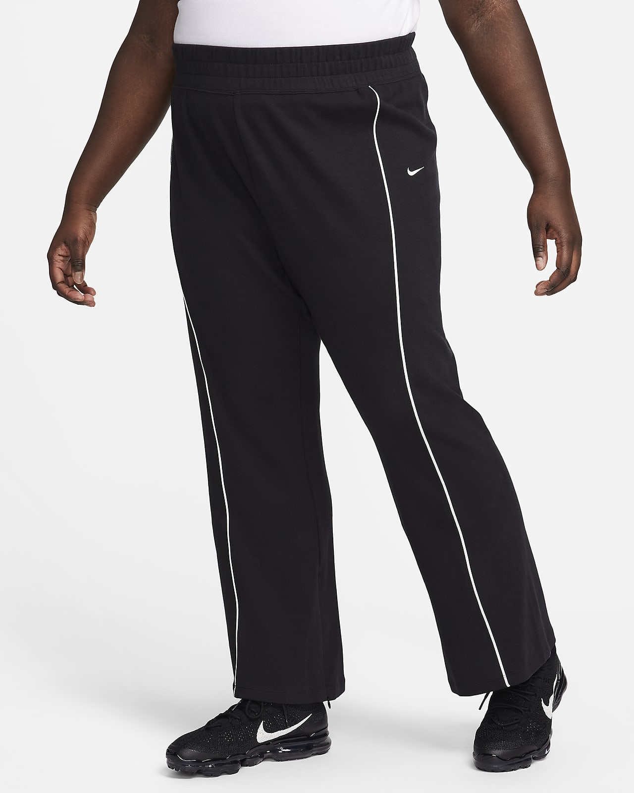 Γυναικείο παντελόνι με άνοιγμα στο τελείωμα Nike Sportswear Collection (μεγάλα μεγέθη)