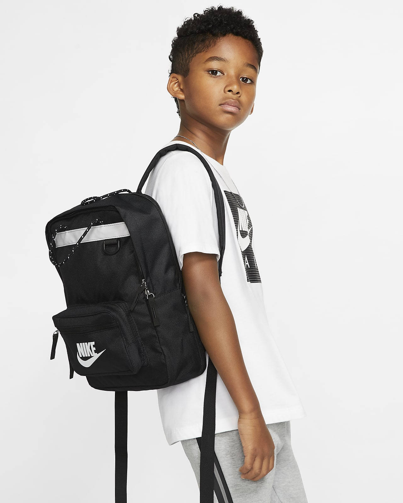 Grifo Egomanía camuflaje Nike Tanjun Kids' Backpack. (11L). Nike.com