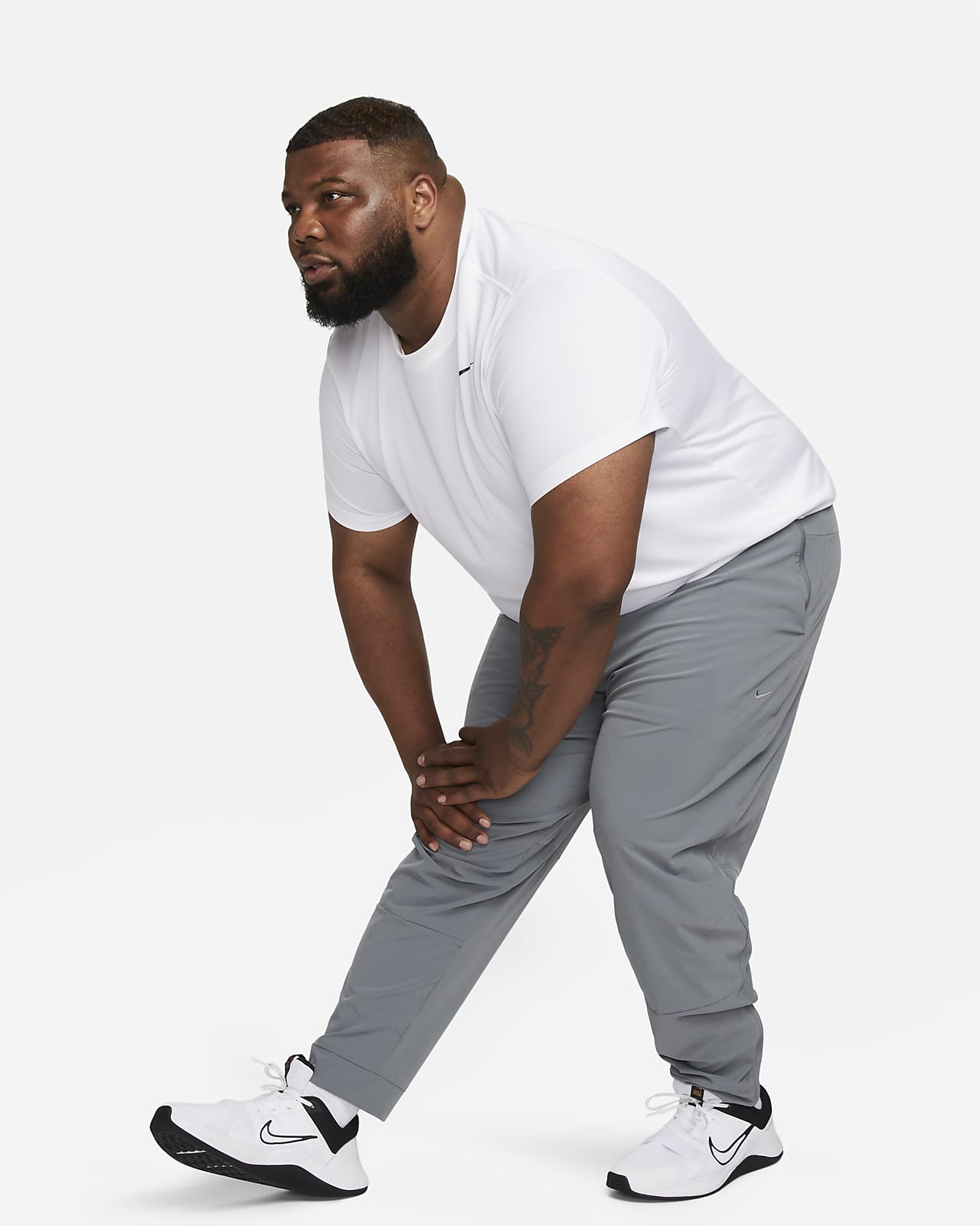 Nike Unlimited Men's Dri-FIT Zip Cuff Versatile Trousers. Nike CA