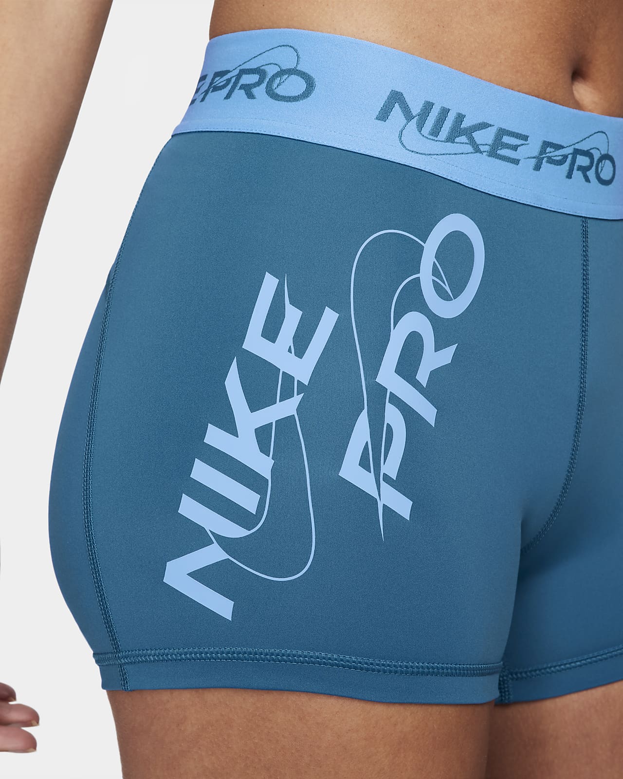 Nike Pro Women's Mid Rise Tight Fit 3” Training Shorts. Noise Aqua