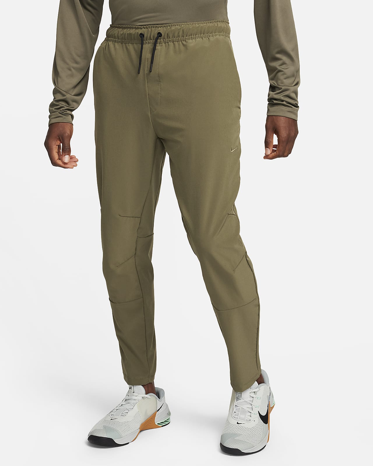 Pants versátiles Dri-FIT de pierna entallada para hombre Nike Unlimited