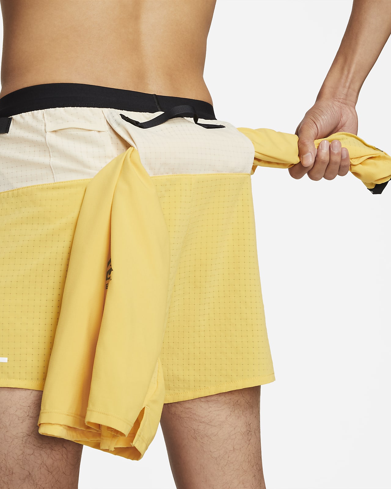 nike trail shorts yellow
