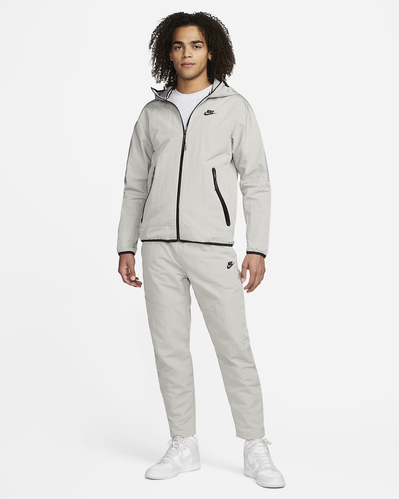 Nike Sportswear Tech Essentials Men's Lined Commuter Trousers. Nike AT
