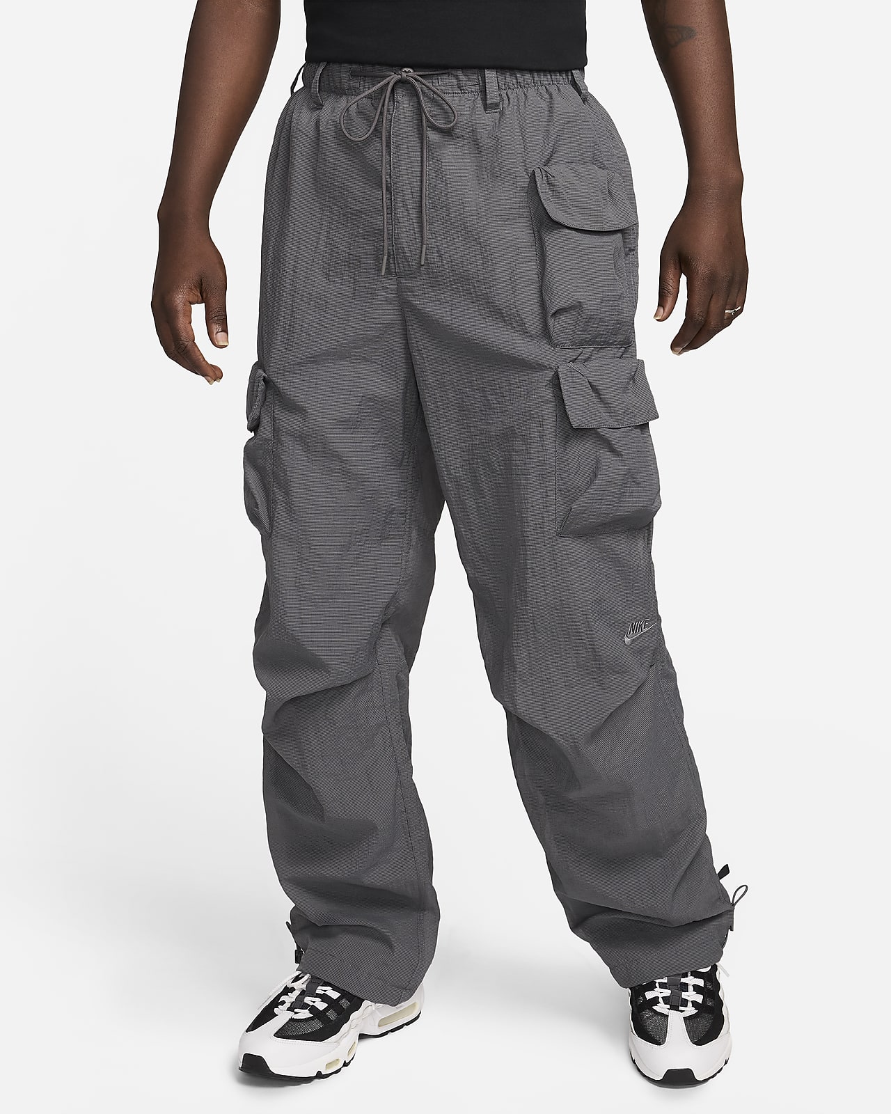 Męskie spodnie z tkaniny z podszewką Nike Sportswear Tech Pack