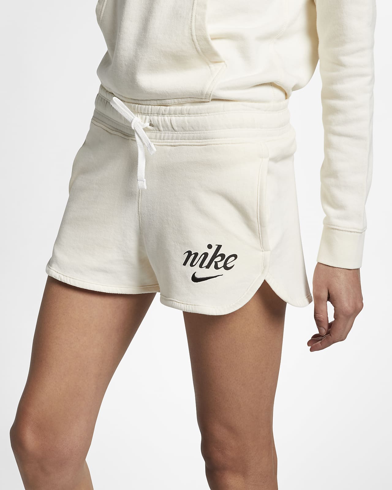 beige nike shorts