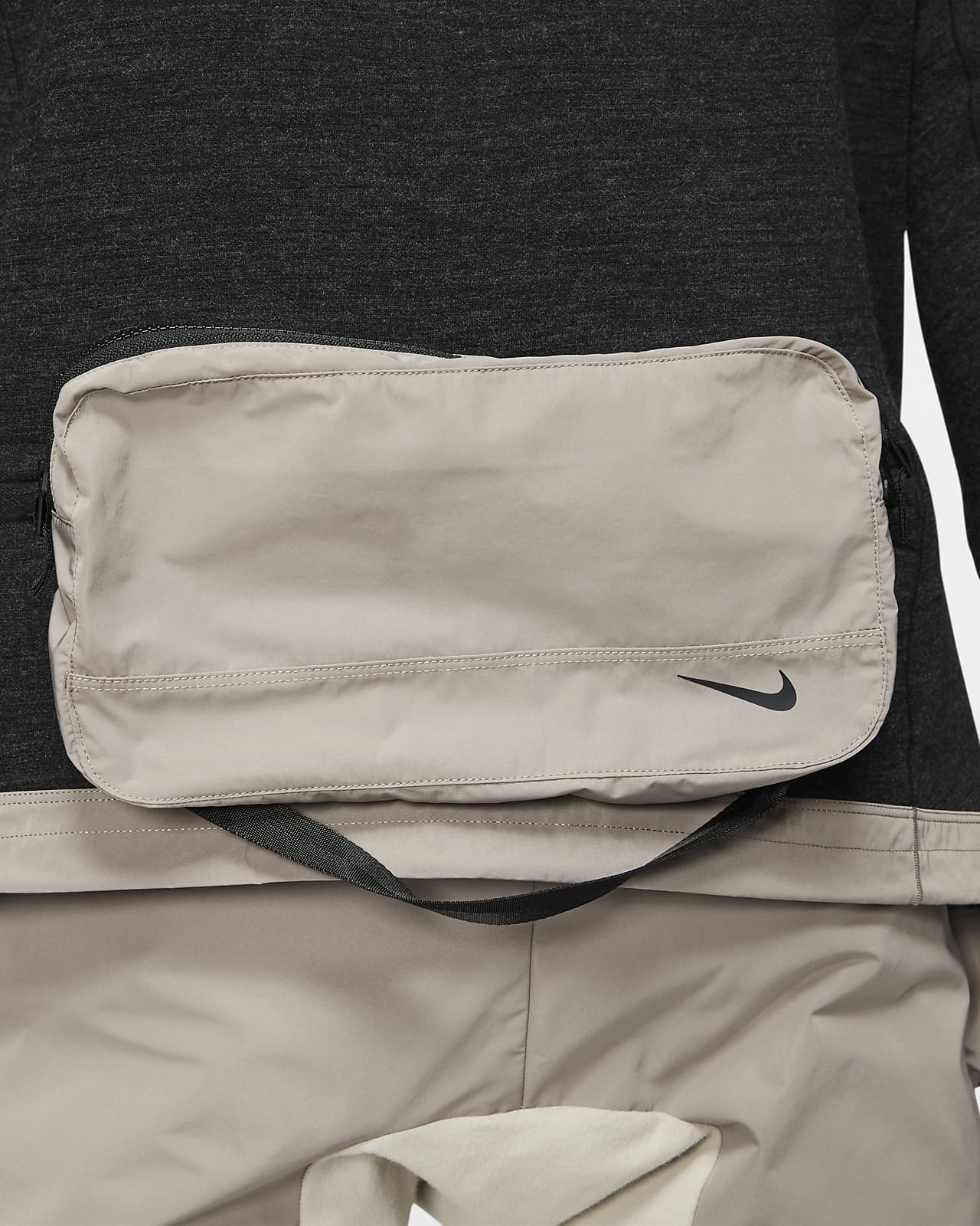 nike jacket that turns into a bag