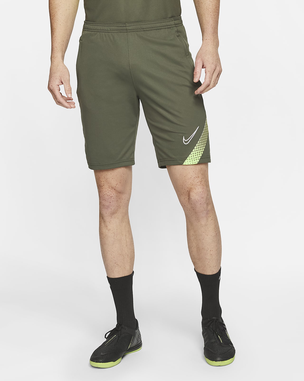 green nike football shorts