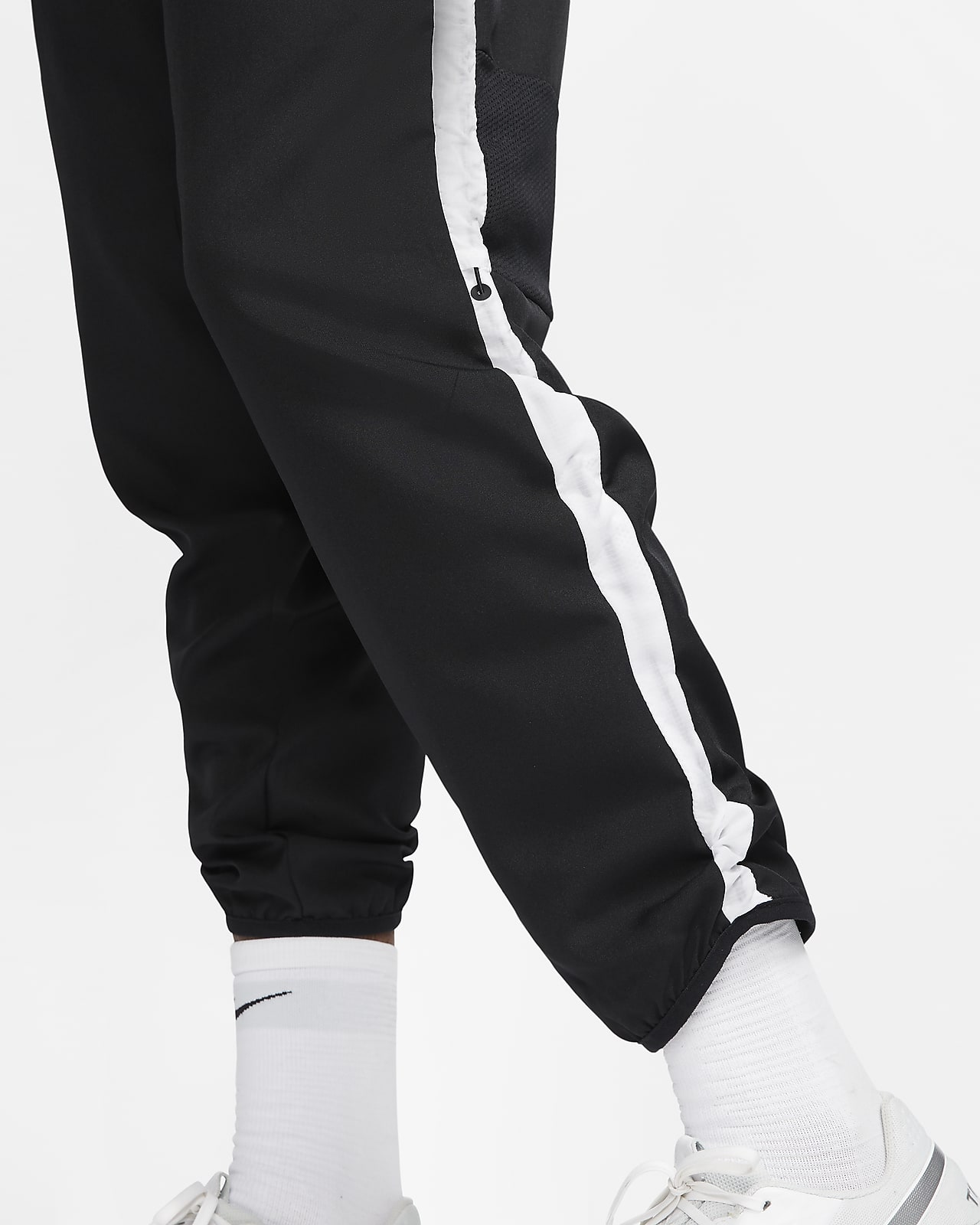 white and black nike pants