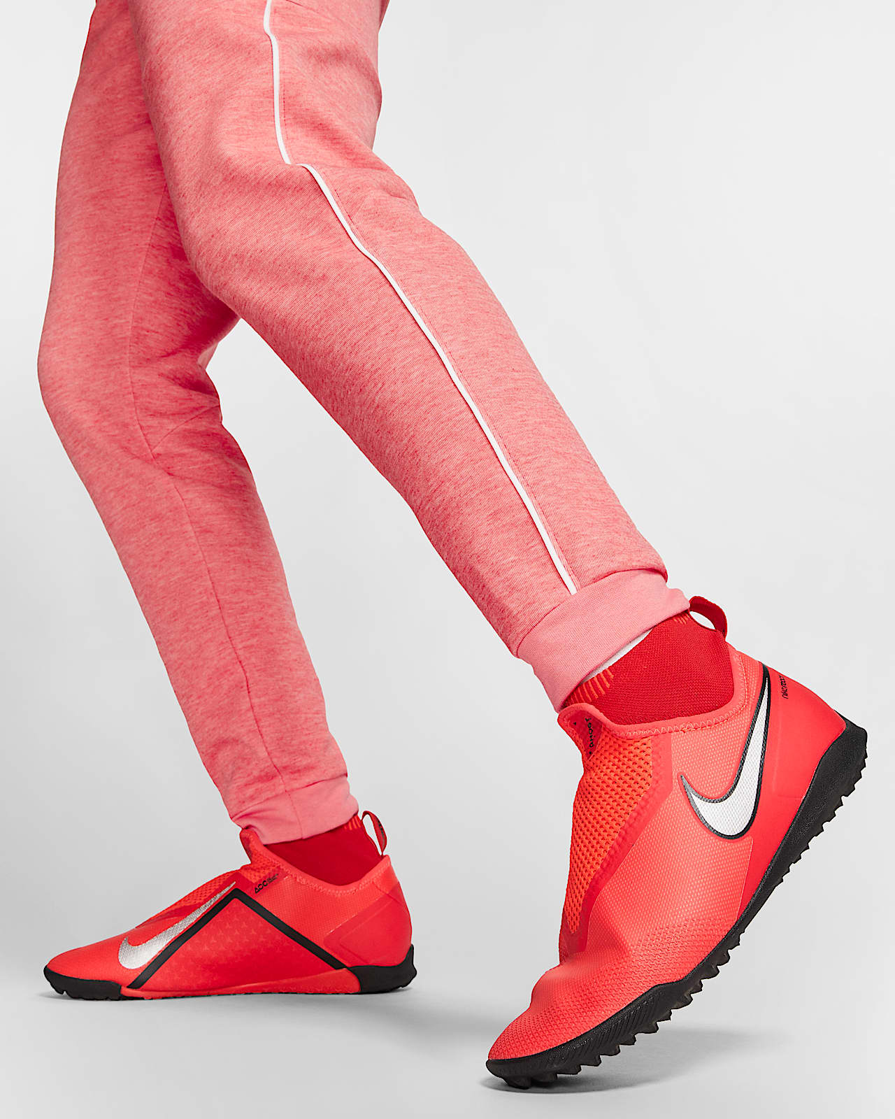red nike football pants