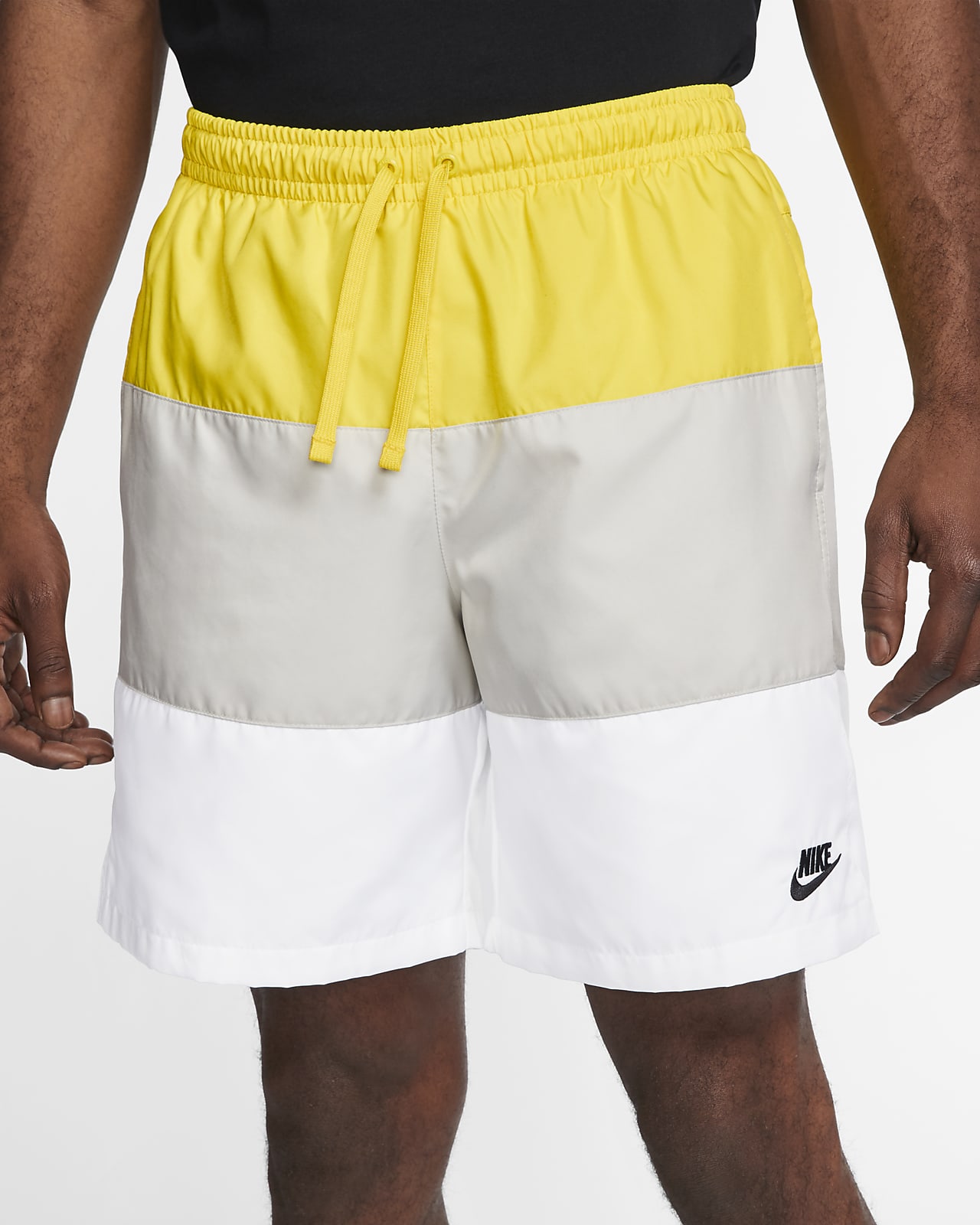yellow and white nike shorts