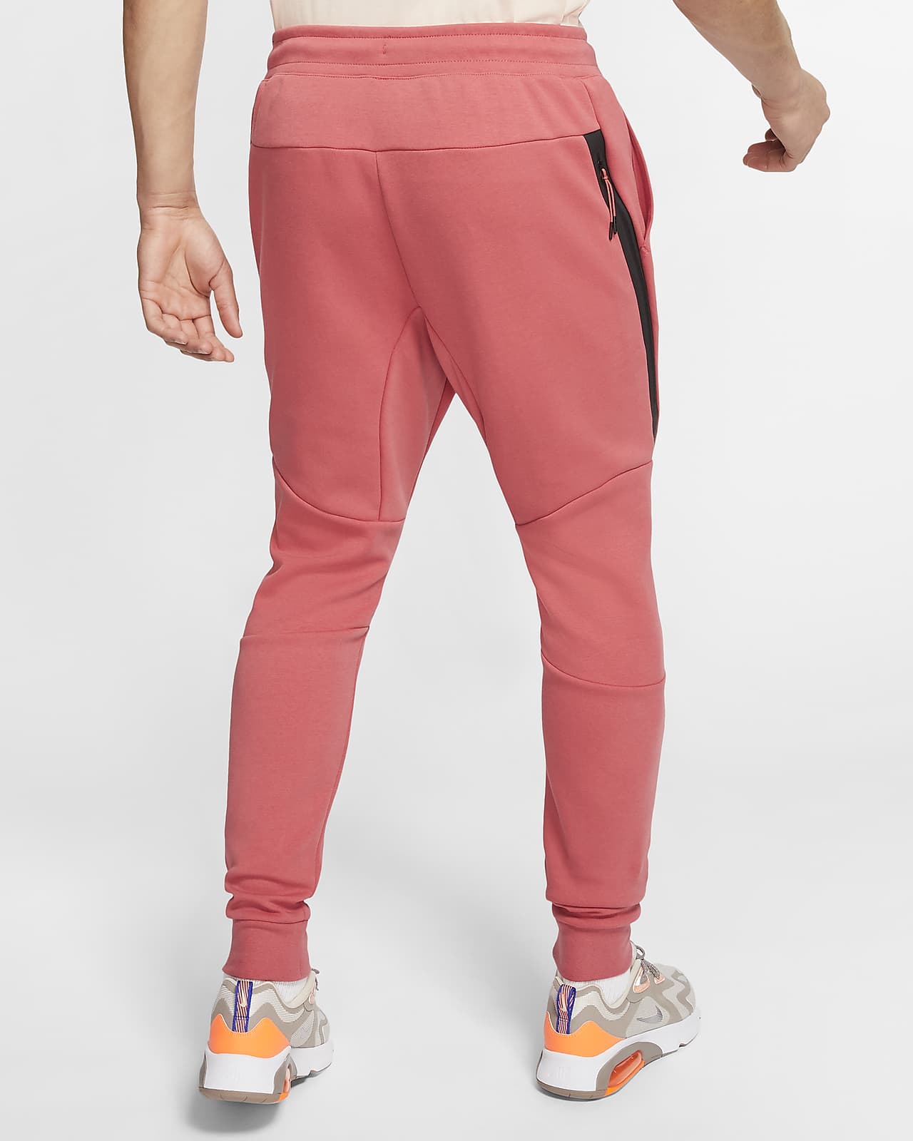 red and blue nike jogging suit