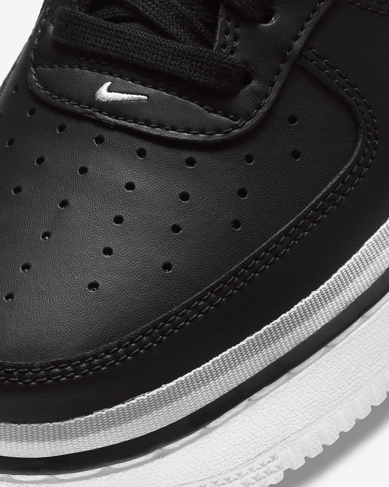 gray and black nike air force 1