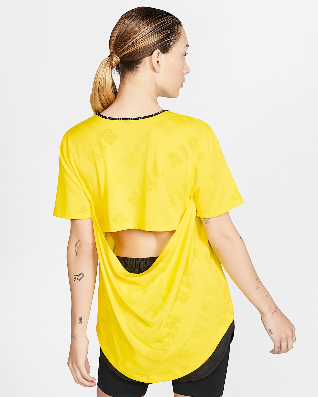 nike yellow running top