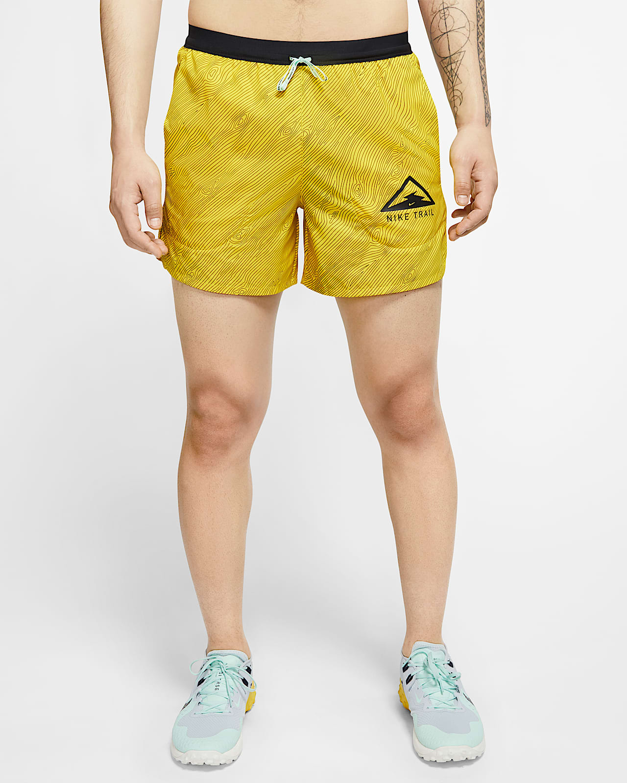 nike trail shorts yellow