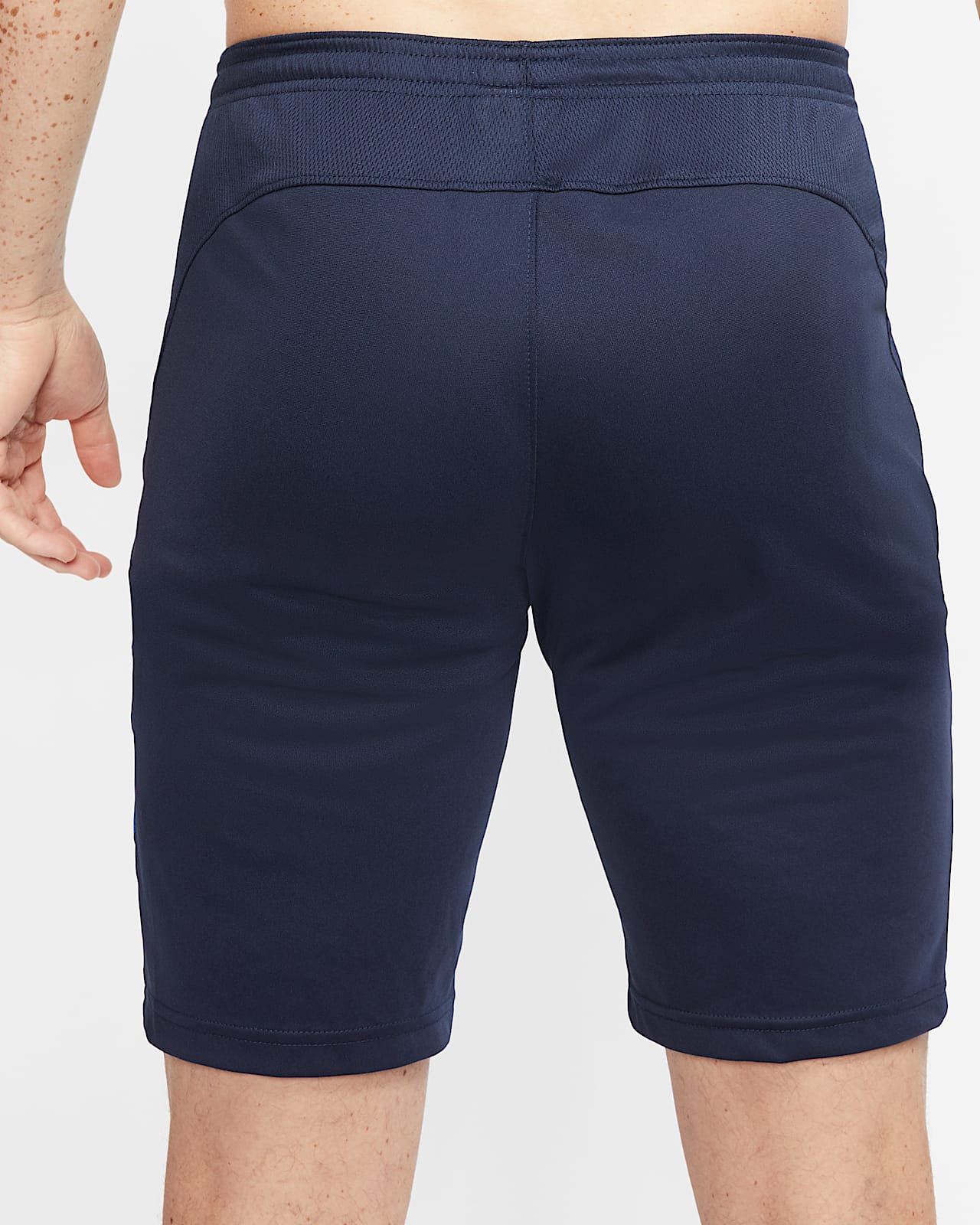 nike football shorts with zip pockets