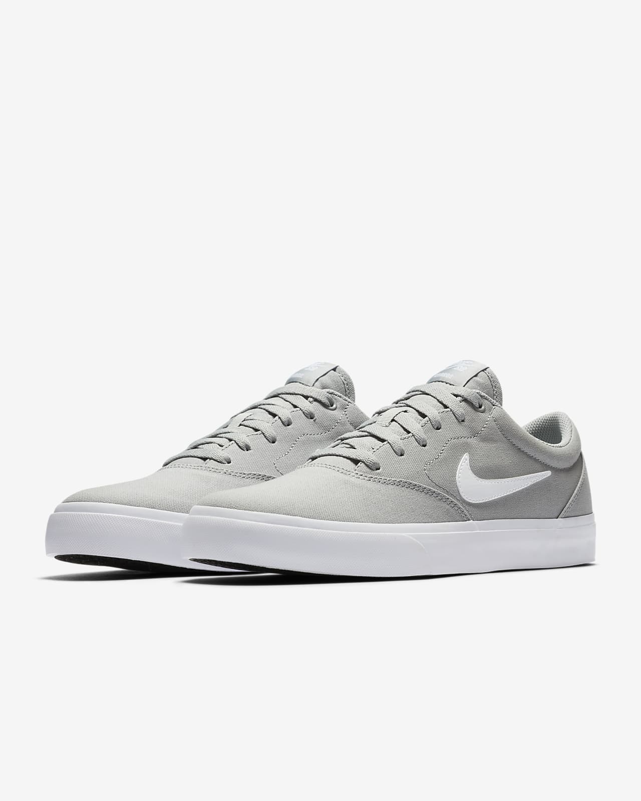 nike sb charge canvas trainers in white