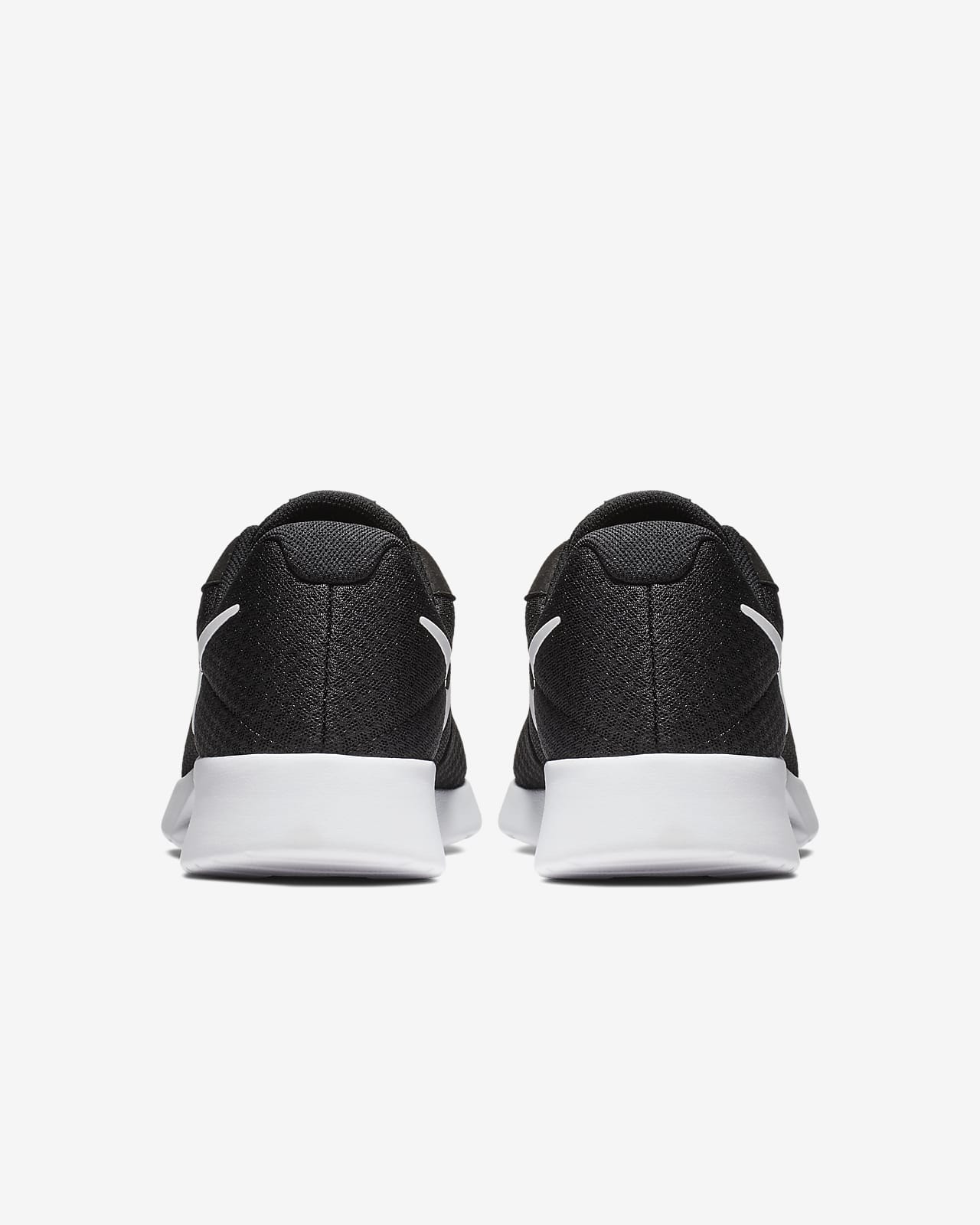 nike tanjun black sneakers