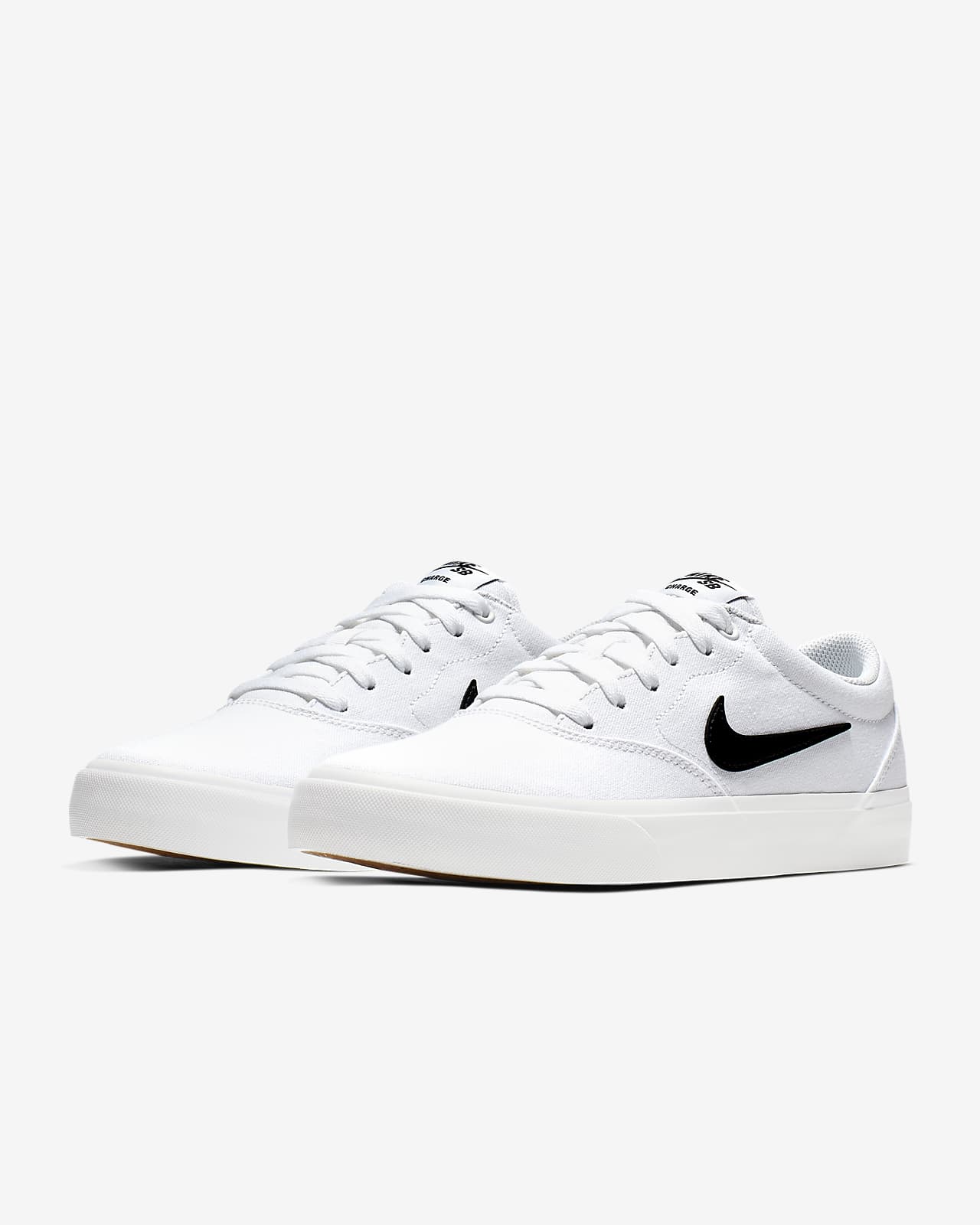nike sb charge canvas sneakers in white
