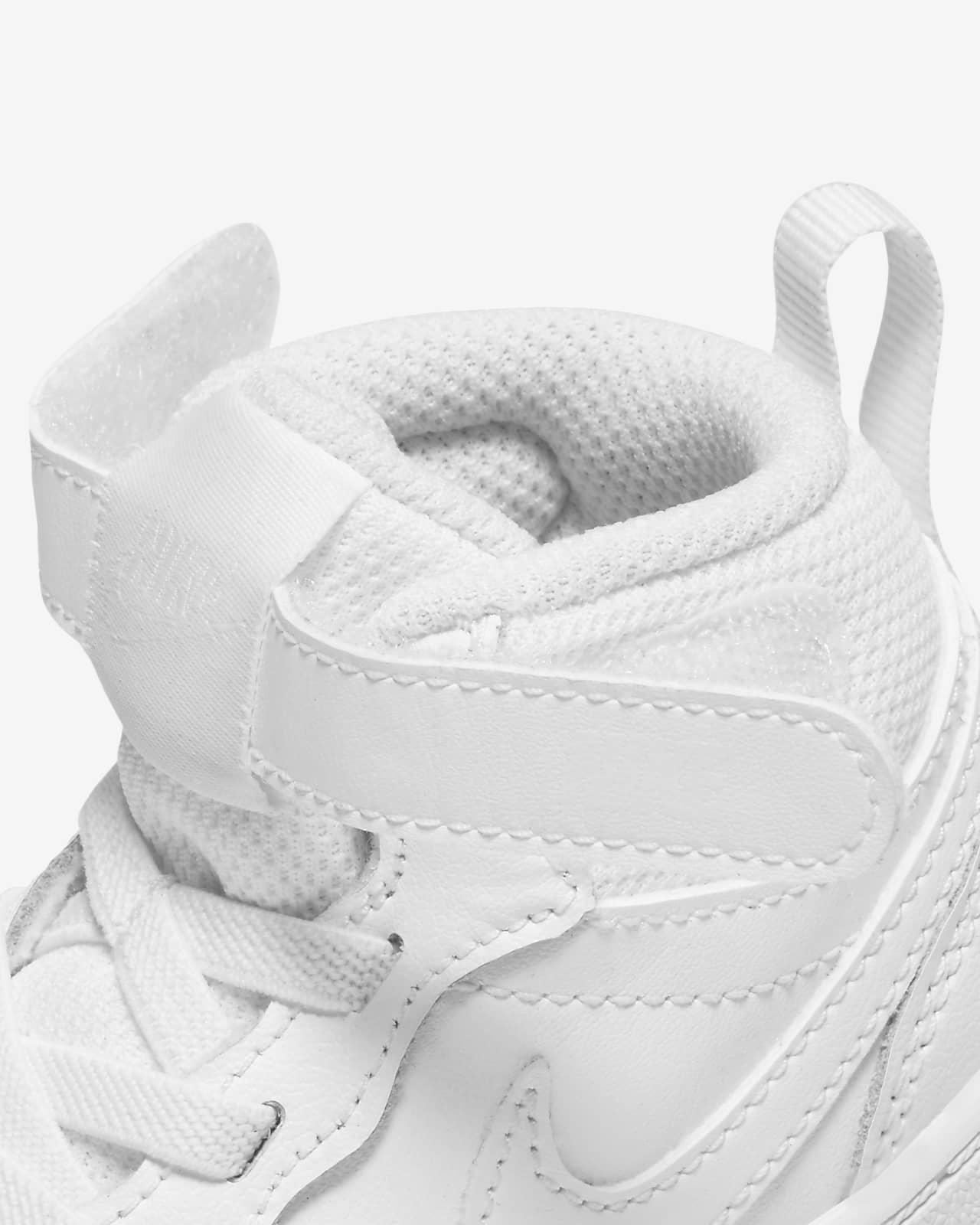 nike first court tradition crib shoes