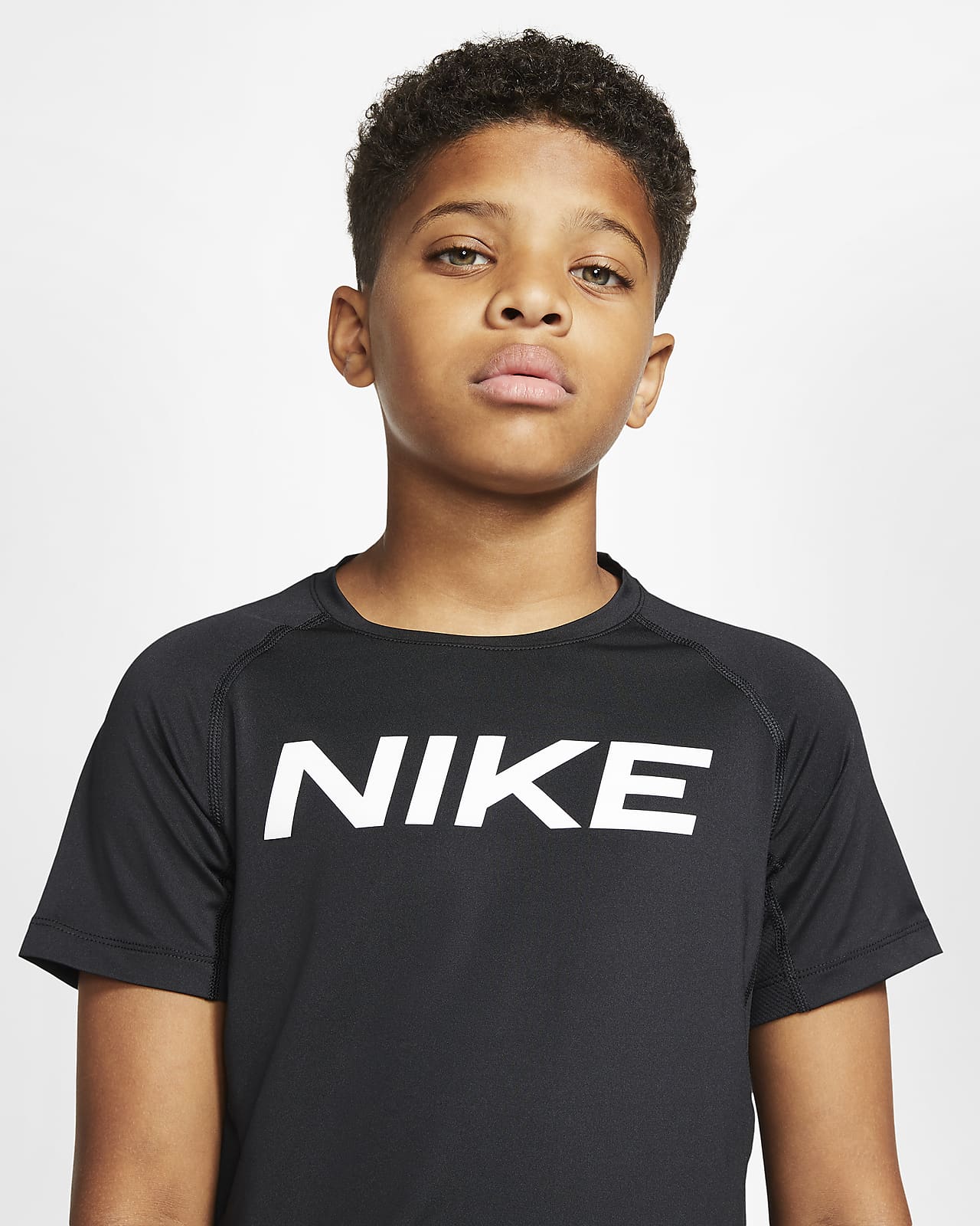 Against Pack to put promotion Nike Pro Big Kids' (Boys') Short-Sleeve Training Top. Nike.com
