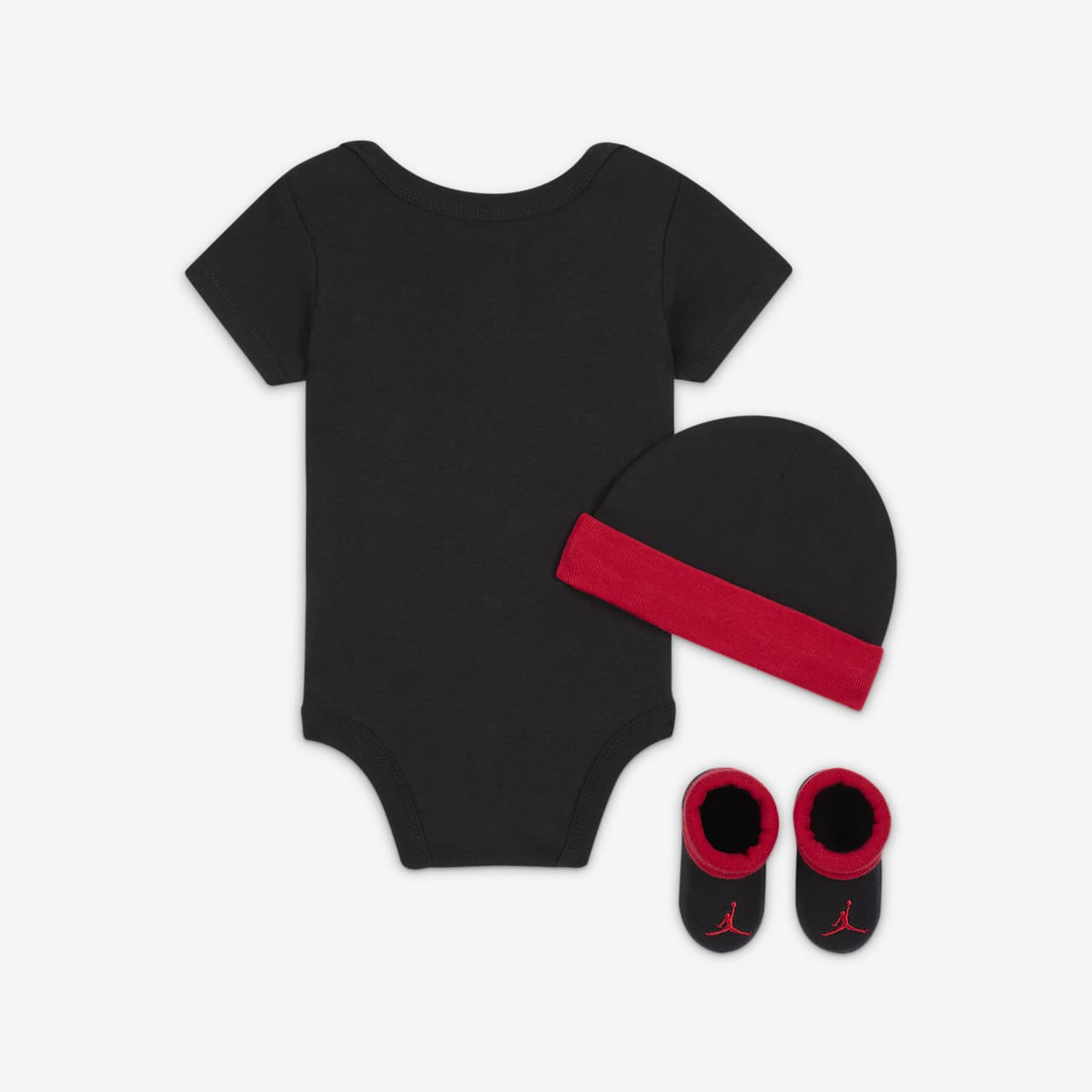 Conjunto de body, gorro y patucos para bebé Jordan Jumpman. Nike.com