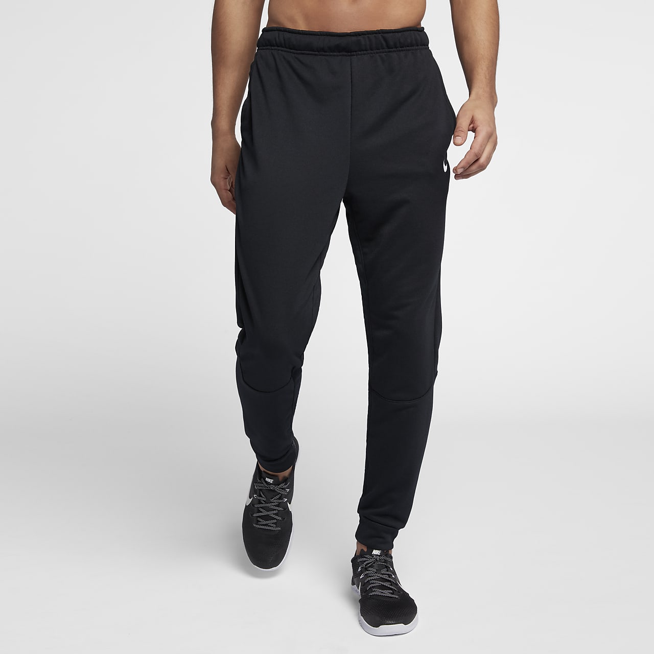 Sierra junto a Anuncio Nike Dri-FIT Men's Tapered Fleece Training Pants. Nike.com