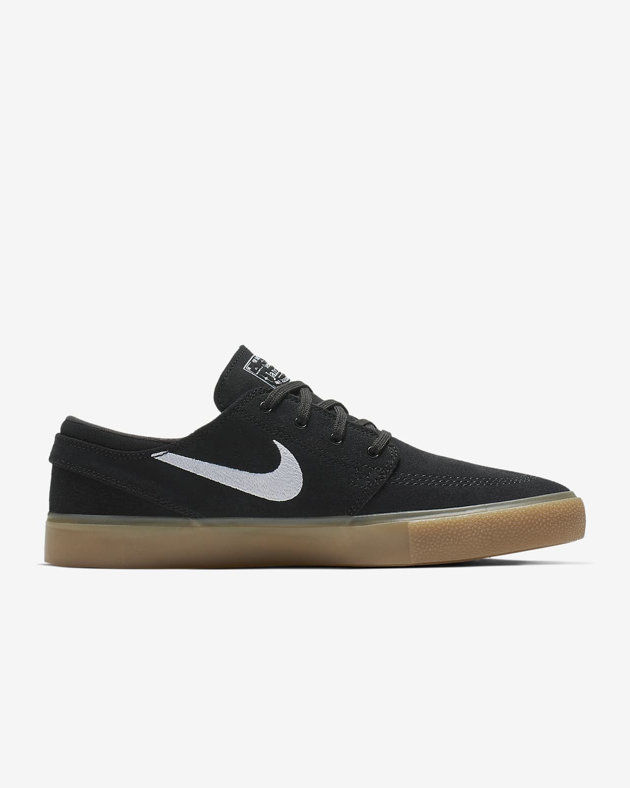 sb zoom janoski trainers in black with gum sole