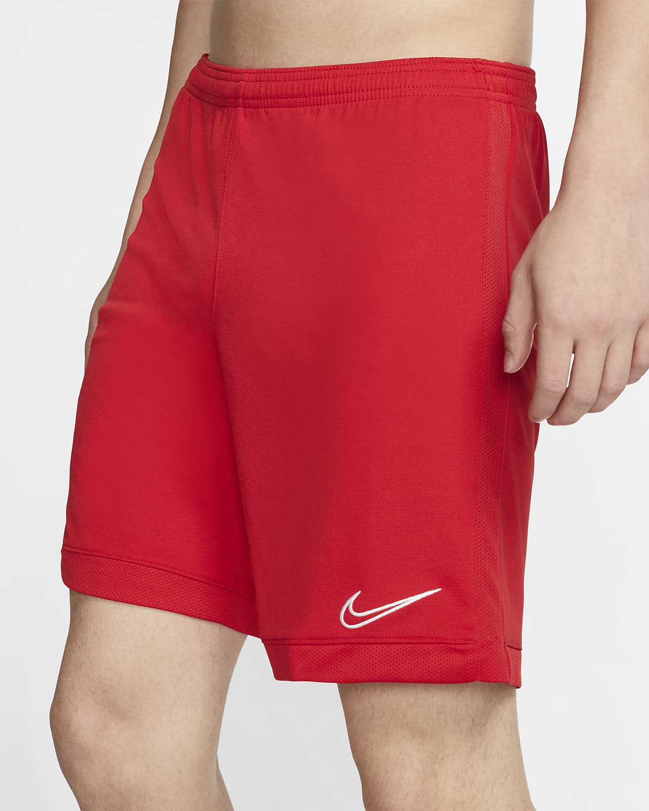 red nike football shorts