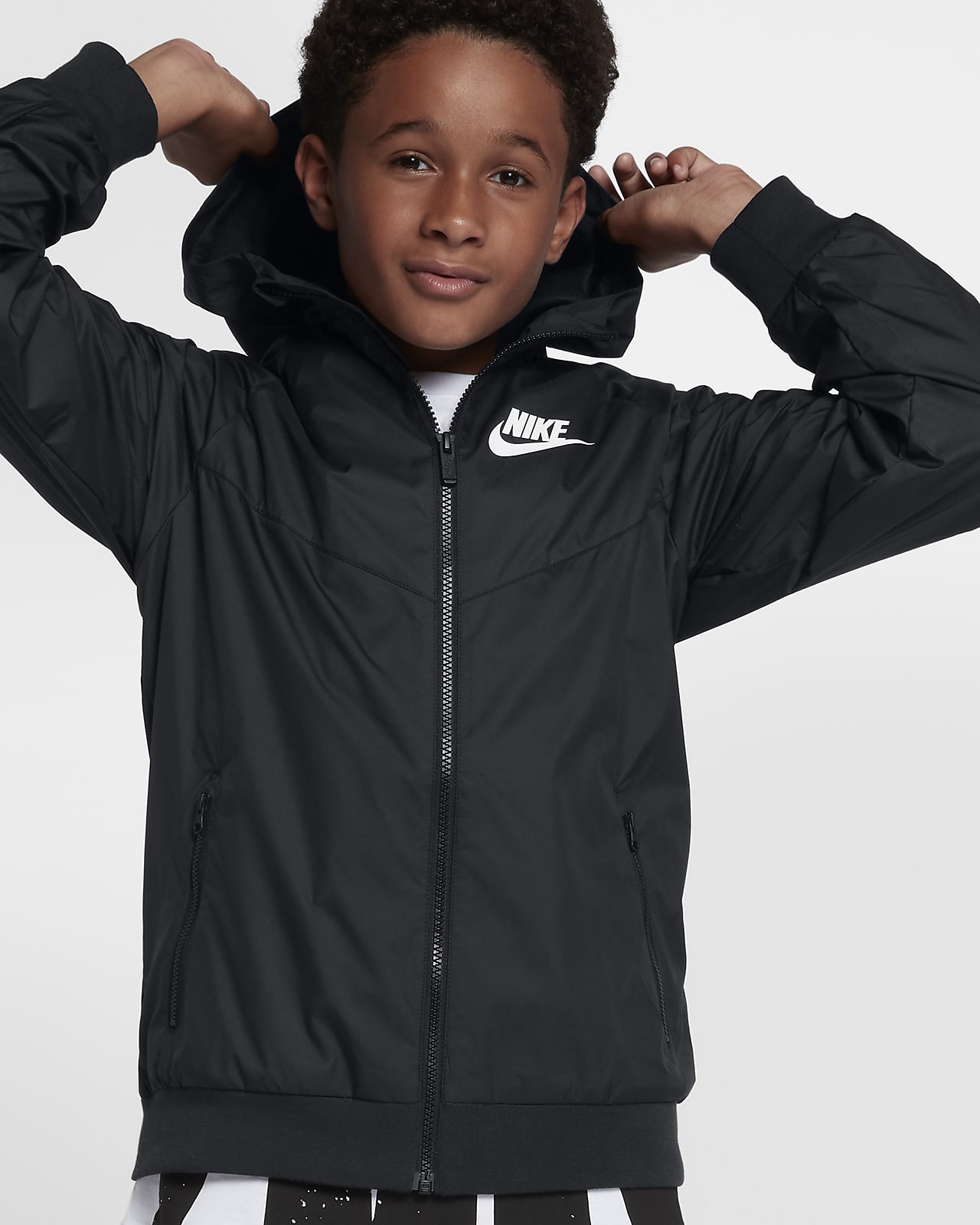 Løstsiddende, hoftelang Nike Sportswear Windrunner-jakke med hætte til større børn (drenge)