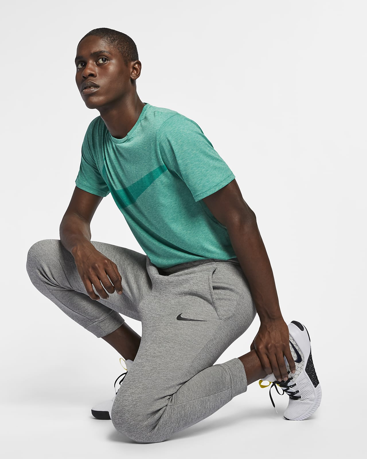 nike training therma track pants