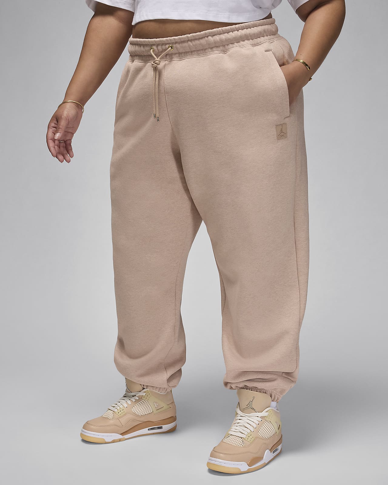 Pantalones de tejido Fleece para mujer Jordan Flight (talla grande)