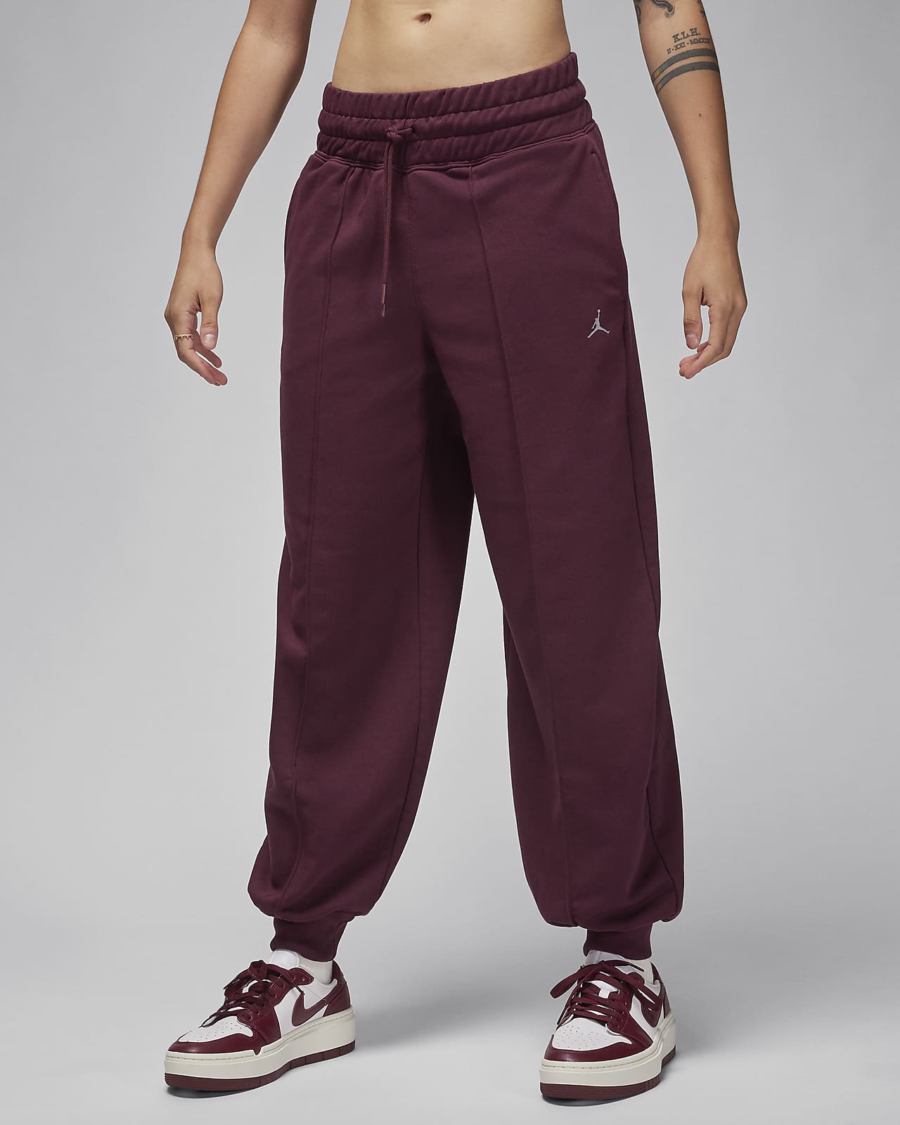 Pantaloni in fleece con grafica Jordan Sport – Donna
