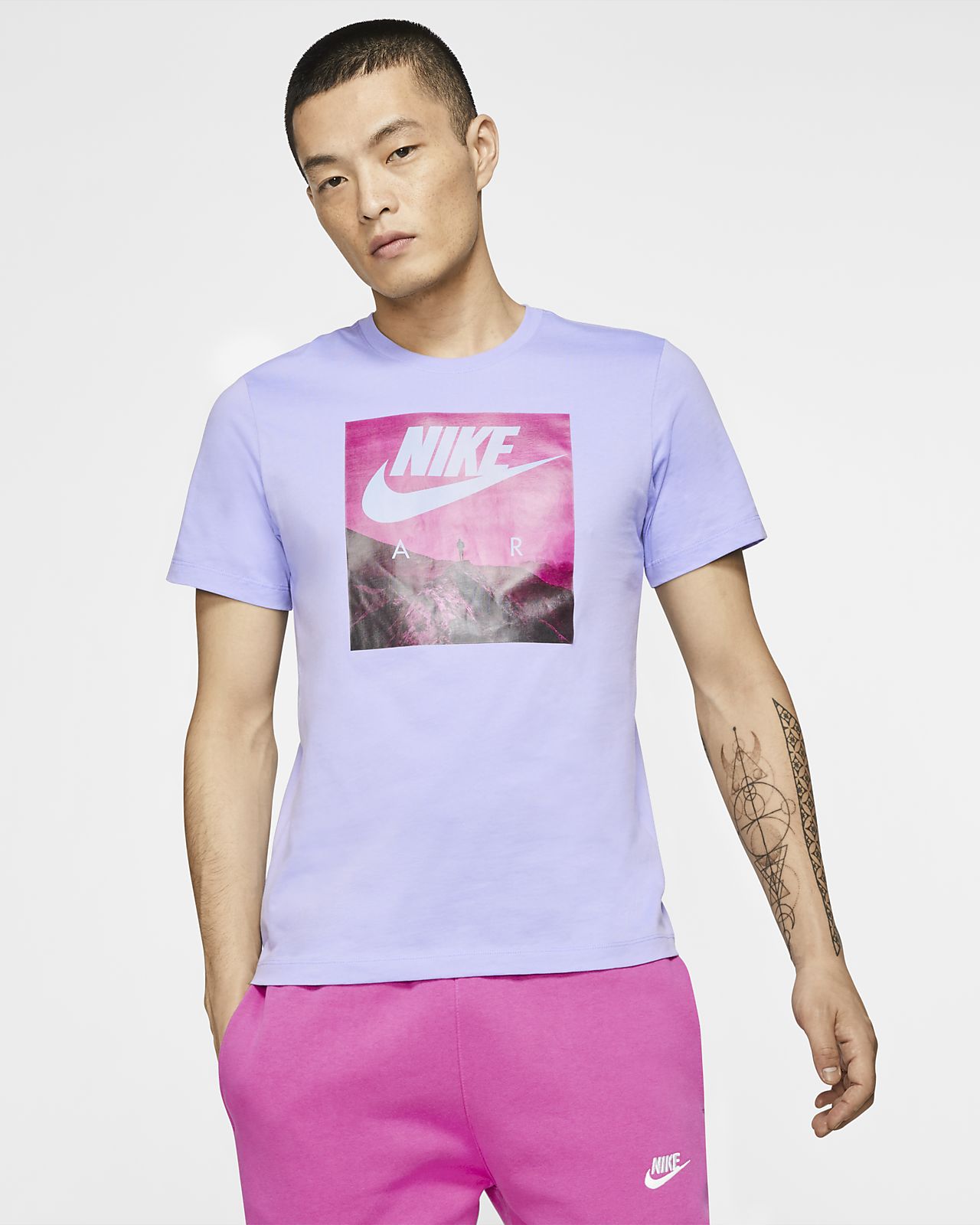purple and pink nike shirt
