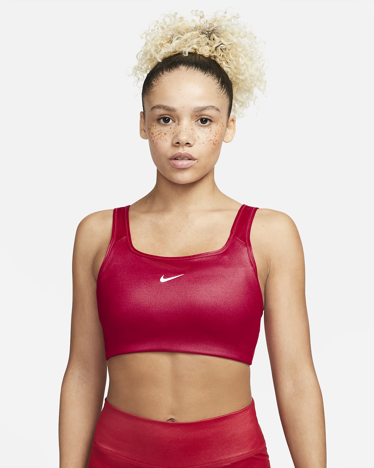 Skinnende Nike Dri-FIT Swoosh-sports-bh med medium støtte og indlæg i ét stykke til kvinder