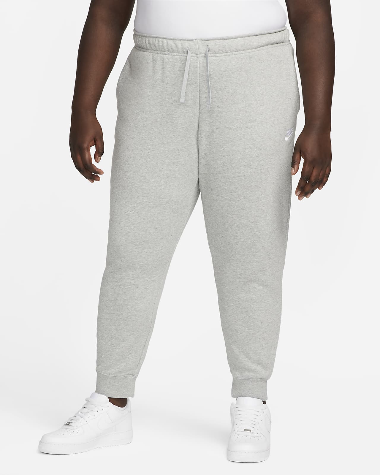 Dámské běžecké kalhoty Nike Sportswear Club Fleece se středně vysokým pasem (větší velikost)