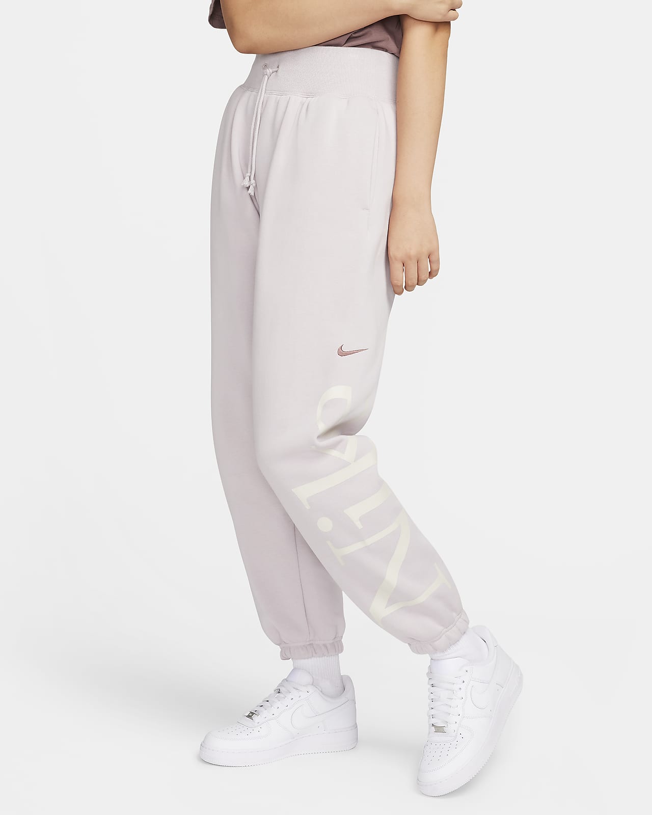 Γυναικείο παντελόνι φόρμας σε φαρδιά γραμμή με λογότυπο Nike Sportswear Phoenix Fleece