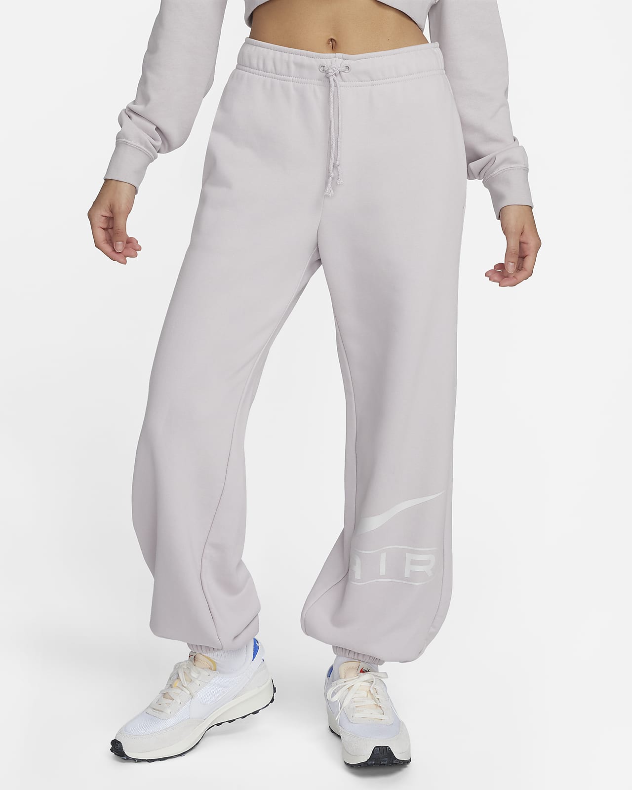 กางเกงจ๊อกกิ้งผ้าฟลีซเอวปานกลางผู้หญิง Nike Air