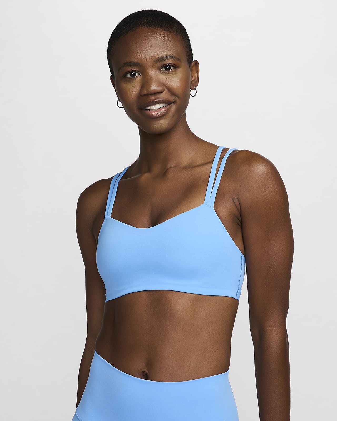 Vadderad sport-BH Nike Zenvy med tunna axelband och lätt stöd för kvinnor