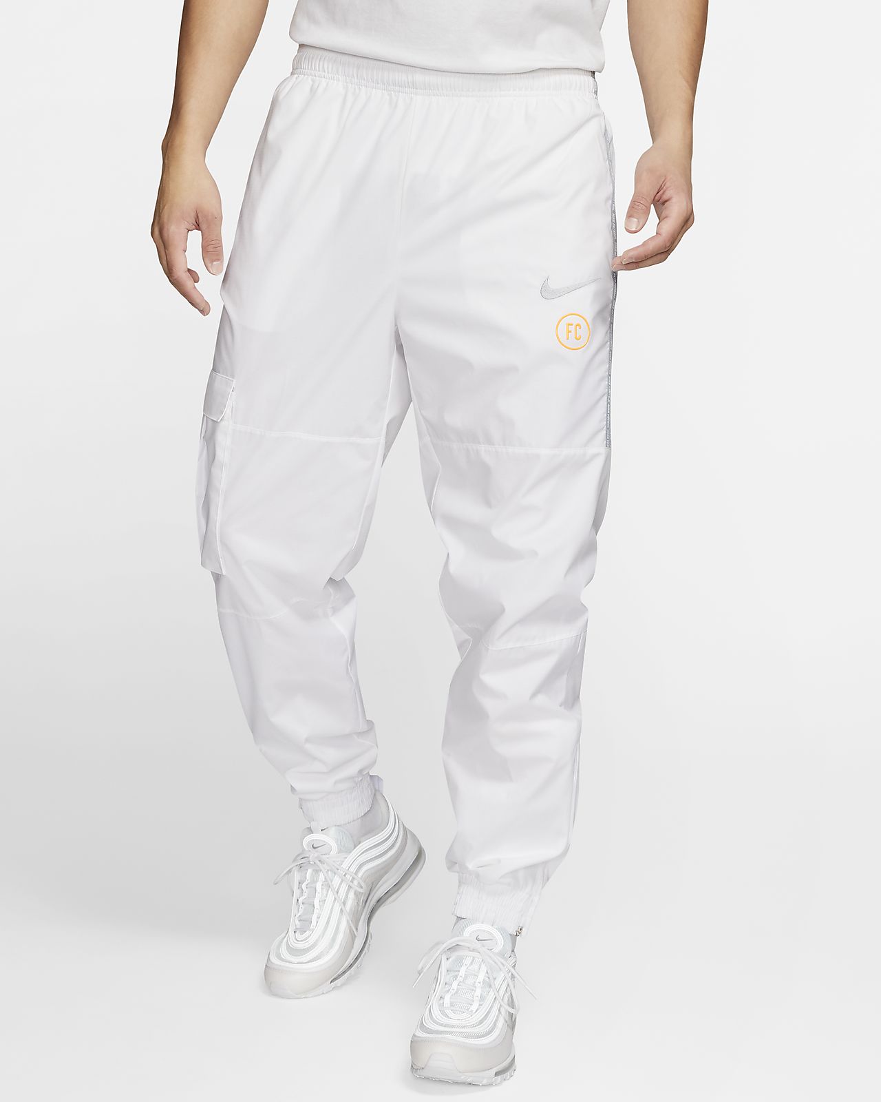 pantalones nike hombre plata