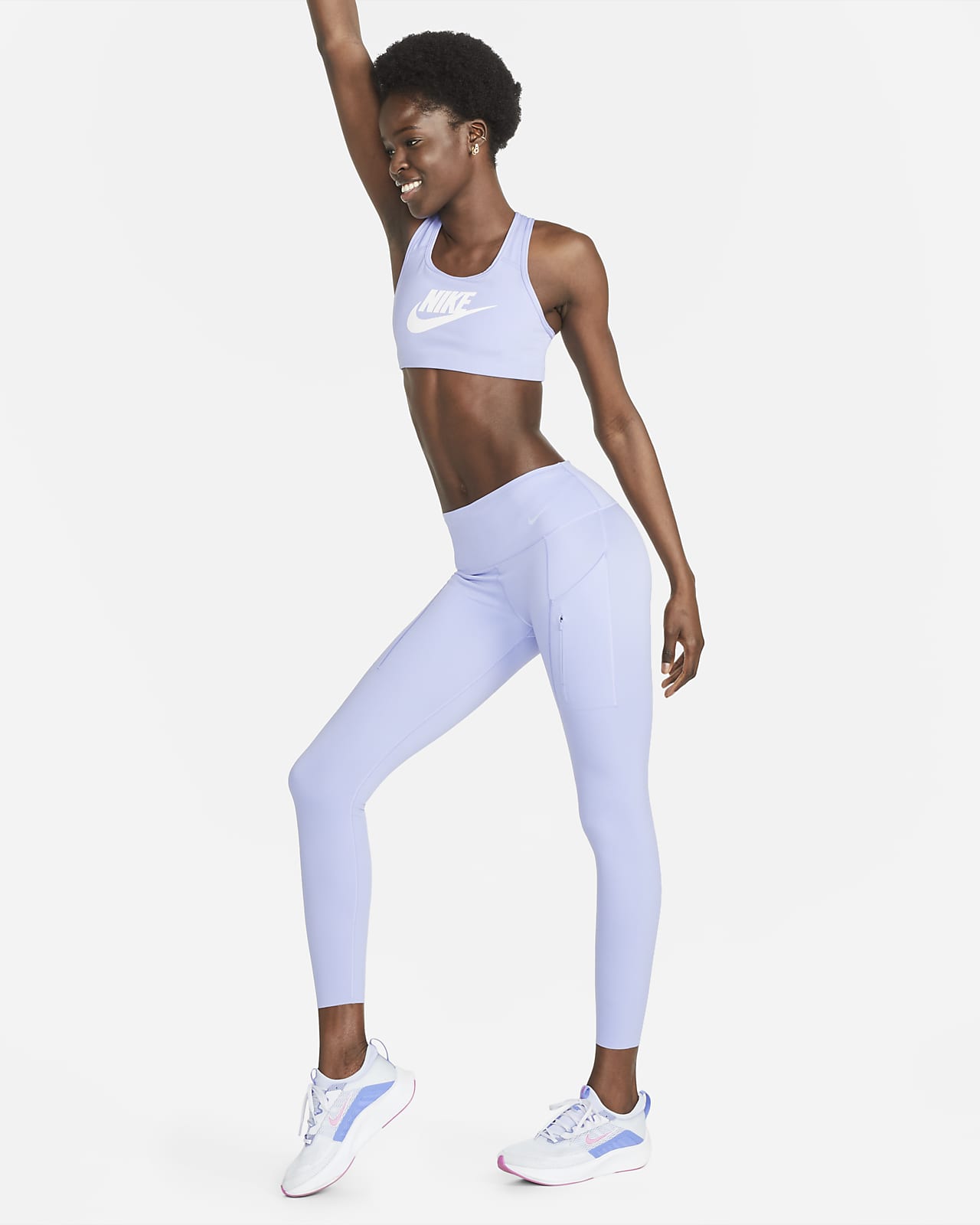 Damskie legginsy ze średnim stanem i kieszeniami o długości 7/8 zapewniające mocne wsparcie Nike Go