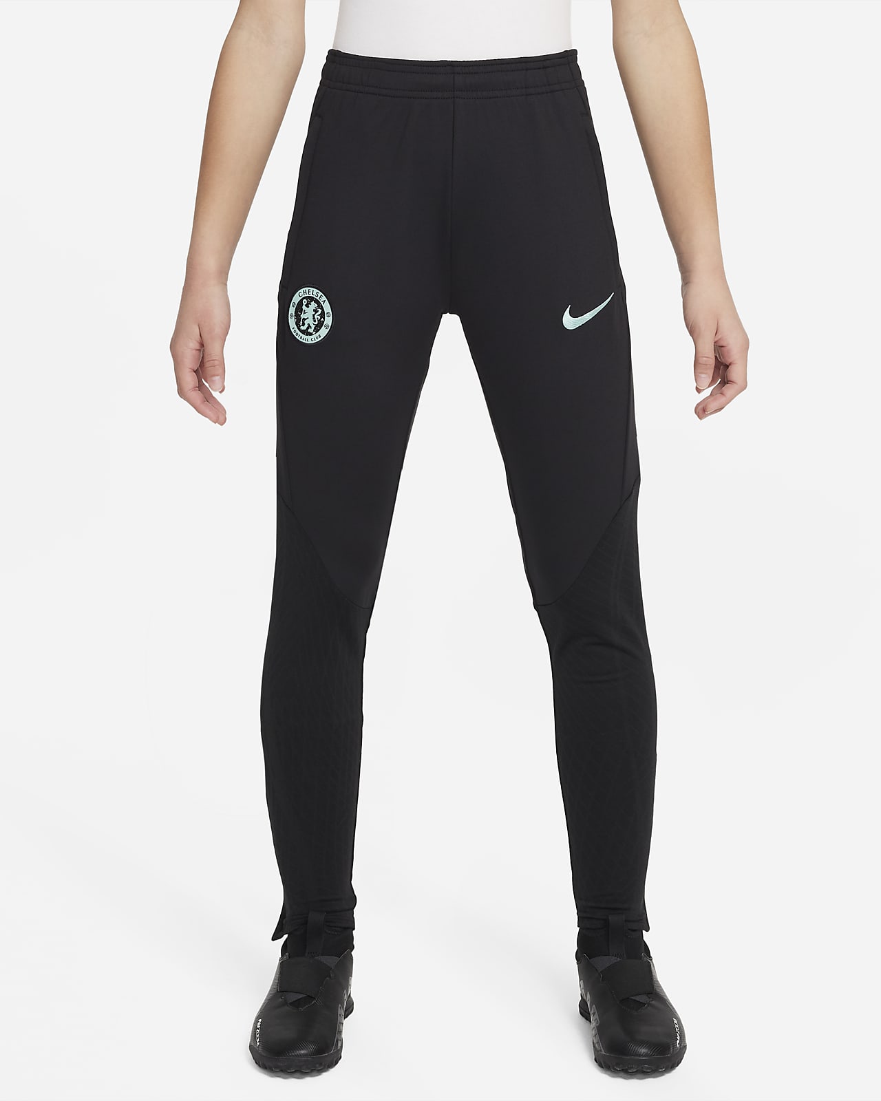 Dzianinowe spodnie piłkarskie dla dużych dzieci Nike Dri-FIT Chelsea F.C. Strike (wersja trzecia)