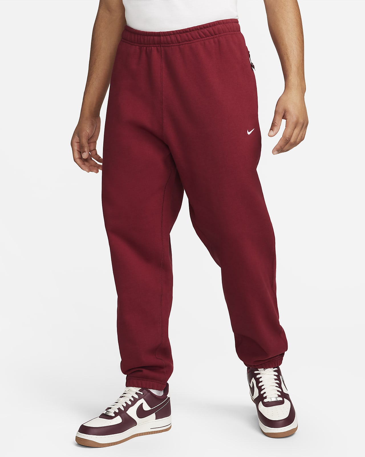 Nike Solo Swoosh Pantalons de teixit Fleece - Home